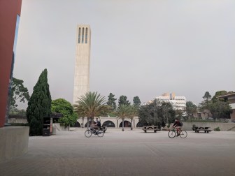 Iconic belltower with the smoke backdrop.